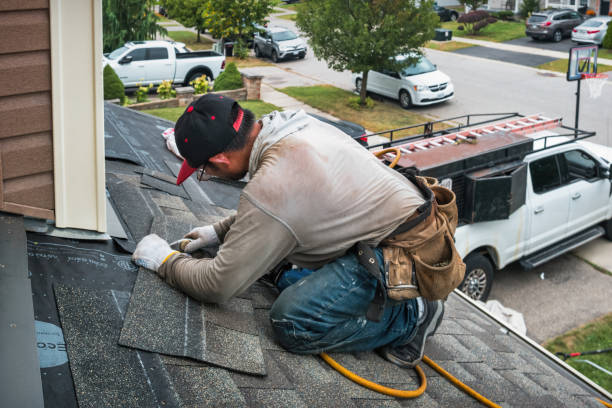 Professional Roof Replacement technician working in Blakely Island, WA
